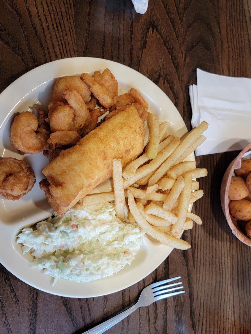 Comfort food plates near the window.